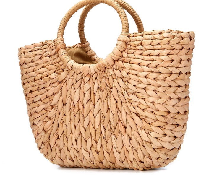 Bolso de paja con asa disponible en cuatro colores enAmazonpor26,99 euros.